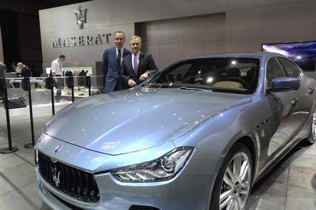 Maserati CEO Harald Wester (right) with the Ghibli Ermenegildo Zegna concept at the Paris Car Show