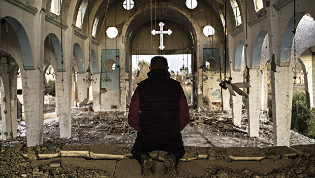 В разрушенном боевиками православно храме, Сирия. Архивное фото