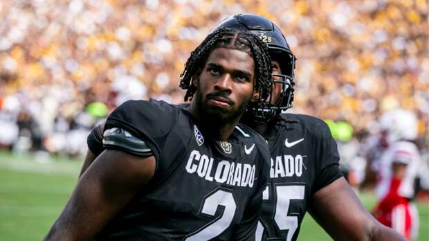 Colorado quarterback Shedeur Sanders flexes watch in face of Nebraska football player