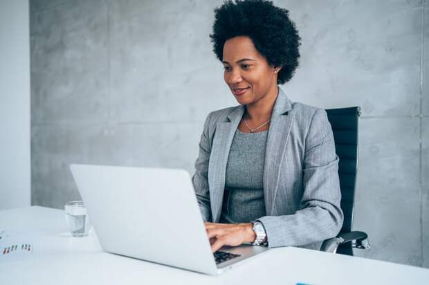 A person at a laptop.