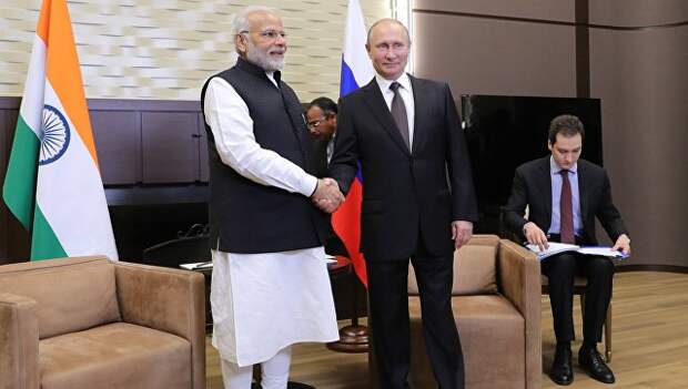 Президент РФ Владимир Путин и премьер-министр Республики Индии Нарендра Моди во время встречи. 21 мая 2018