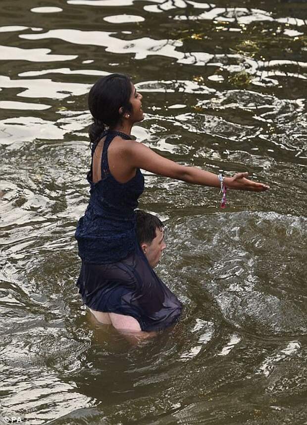 Some stripped down to their underwear while others wrecked their expensive outfits by soaking them in the river
