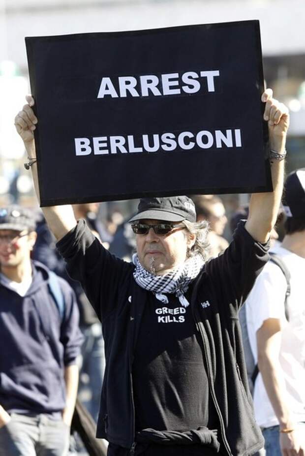 A protester of the 'Indignant' group demonstrates against banking and finance in Rome