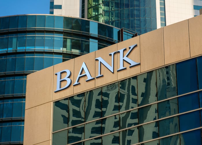 Bank sign on building.
