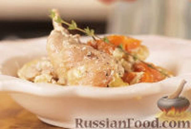Фото к рецепту: Кролик, запеченный в сливках, с овощами