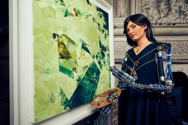 Ai-Da robot artist with art painting