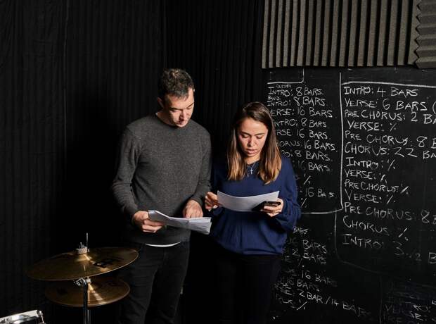 Metajive's Dave and April Benton deep in paperwork. Photographed by Franz Steiner.