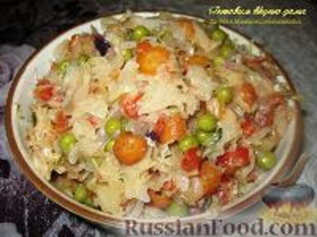 Фото к рецепту: Капуста, тушенная с овощами
