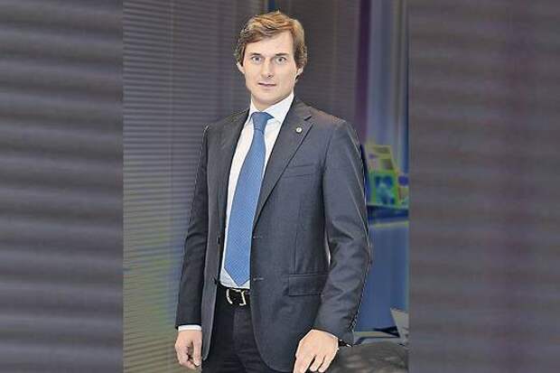 Вице-президент Сбербанка Максим Дегтярев Коллаж с использованием фотографии Павла Фомина