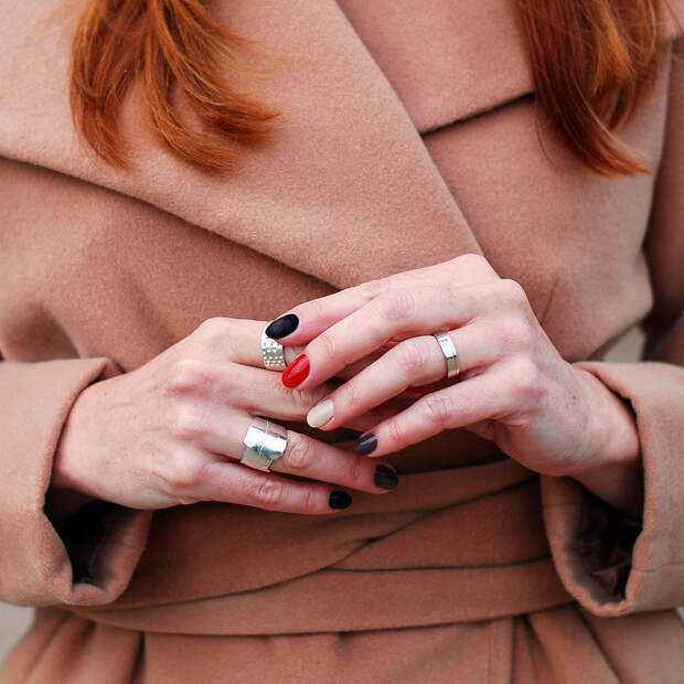 Camel coat, silver rings, autumnal manicure