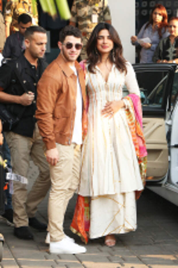 Priyanka Chopra And Nick Jonas Arrive Ahead Of Wedding Via Private Jet Pictured: Nick Jonas,Priyanka Chopra Ref: SPL5045371 281118 NON-EXCLUSIVE Picture by: SplashNews.com Splash News and Pictures Los Angeles: 310-821-2666 New York: 212-619-2666 London: 0207 644 7656 Milan: 02 4399 8577 photodesk@splashnews.com World Rights