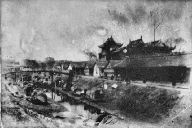 the-old-city-of-shanghai-pictured-here-in-the-1880s-came-complete-with-moat
