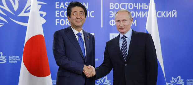 Встреча президента РФ В.Путина с премьер-министром Японии С.Абэ в рамках ВЭФ 2016