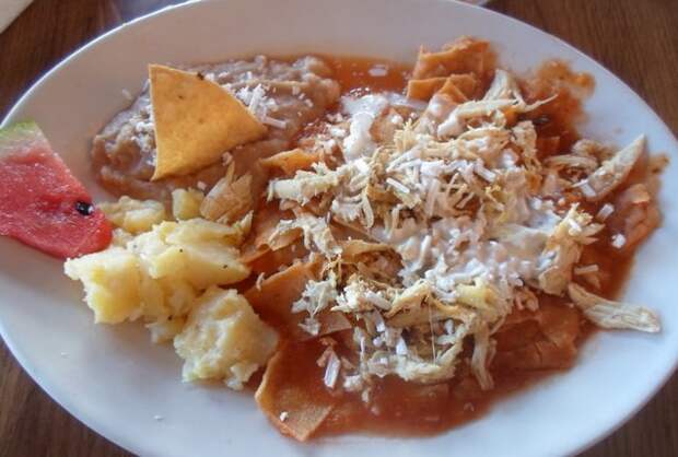 tortilla chips simmered in mole