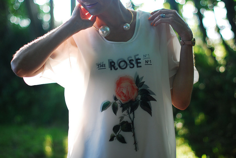 Chanel-style double pearl necklace with sheer rose top