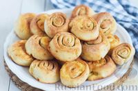 Фото к рецепту: Творожные булочки с чесноком и сыром