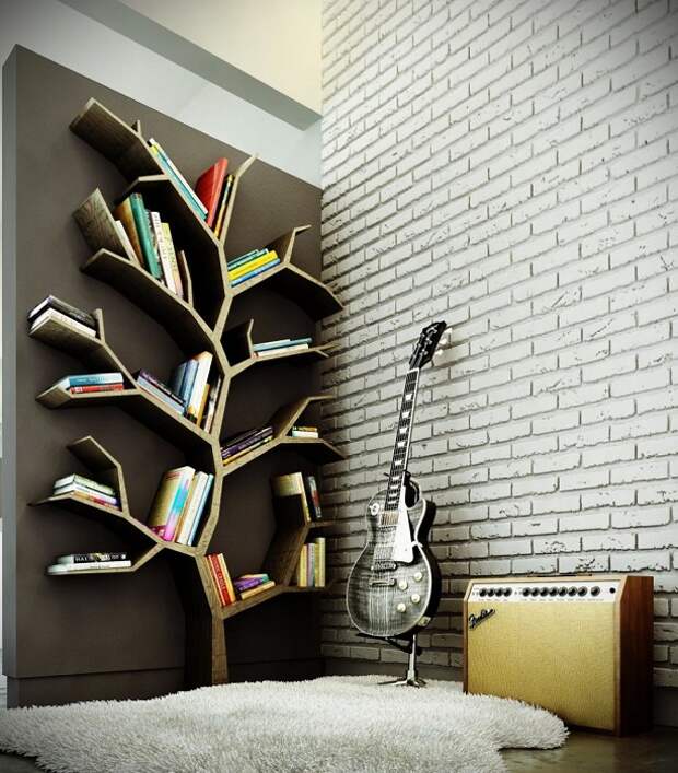 Хороший вариант создания комфортной обстановки в комнате с помощью полок в виде дерева.