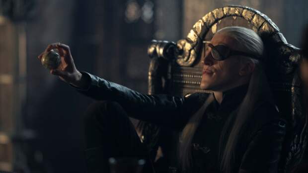 Ewan Mitchell as Aemond Targaryen, currently serving in his brother's place.