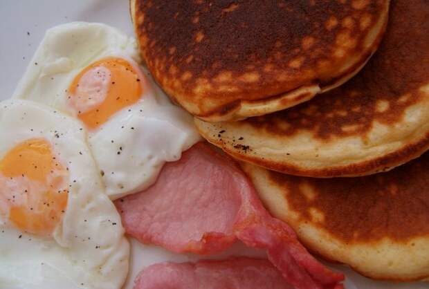 Eggs, toast, bacon or sausage, pancakes, home fries