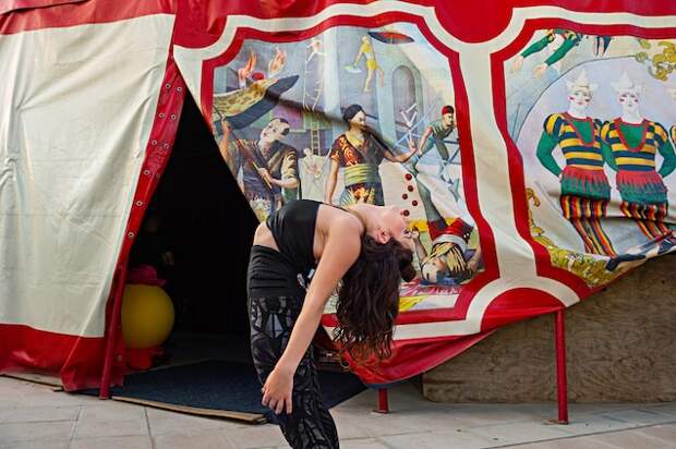 At the Circo Raluy Legacy in Spain, Emily Raluy warms up for an acrobatic pole dance that she will perform with her sister. Many circuses include family groups and are matriarchal, Gengotti says.