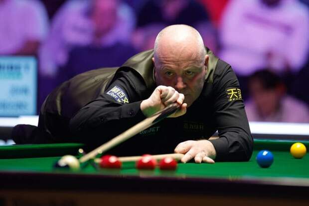 Джон Хиггинс оформил брейки в 76, 82 и 55 очков в 1/16 финала в Челтнеме (фото: WST)