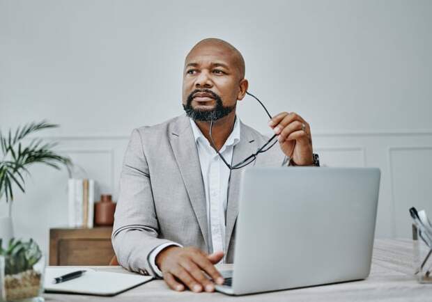 A person at a laptop.