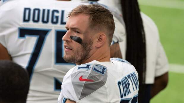Will Compton of the Tennessee Titans stands on the sidelines