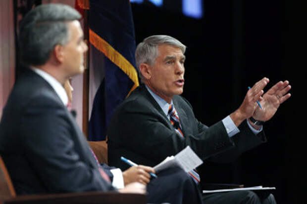 Incumbent U.S. Sen. Mark Udall, D-Colo., right, speaks during a debate with U.S. Rep. Cory Gardner, R-Colo., in Denver, on Monday, Oct. 6, 2014. The two are locked in what many polls report is a tight race, less than one month before election day on Nov. 4, 2014. (AP Photo/Brennan Linsley)