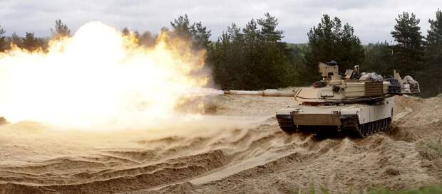 Танк M1A2 Abrams REUTERS/Ints Kalnins