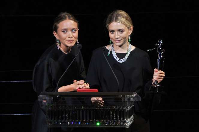 Designers Mary-Kate Olsen (L) and Ashely Olsen